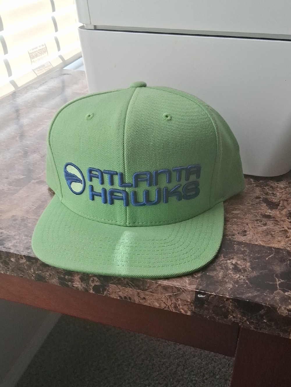Mitchell & Ness Atlanta Hawks Green Snapback Hat with Blue Logo